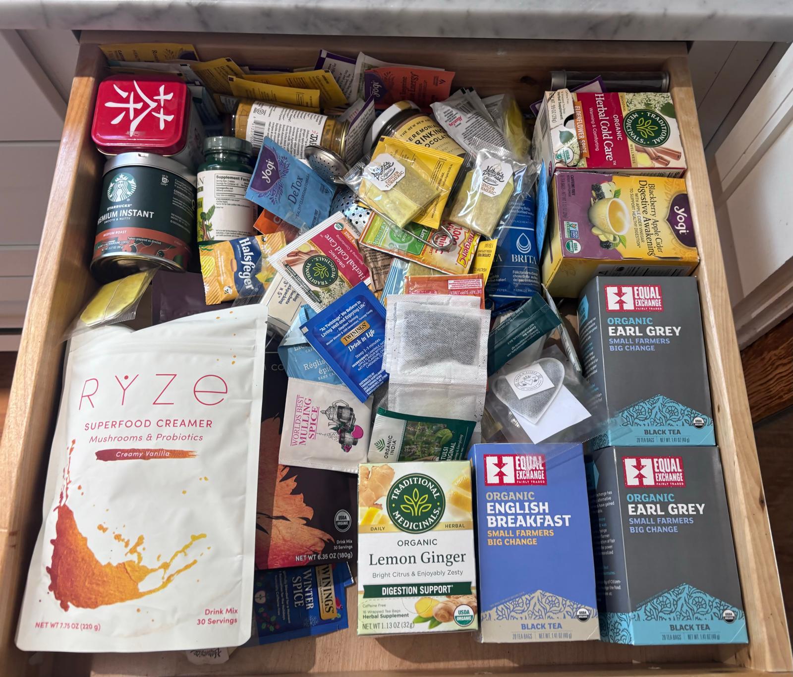 Before: cluttered kitchen drawer