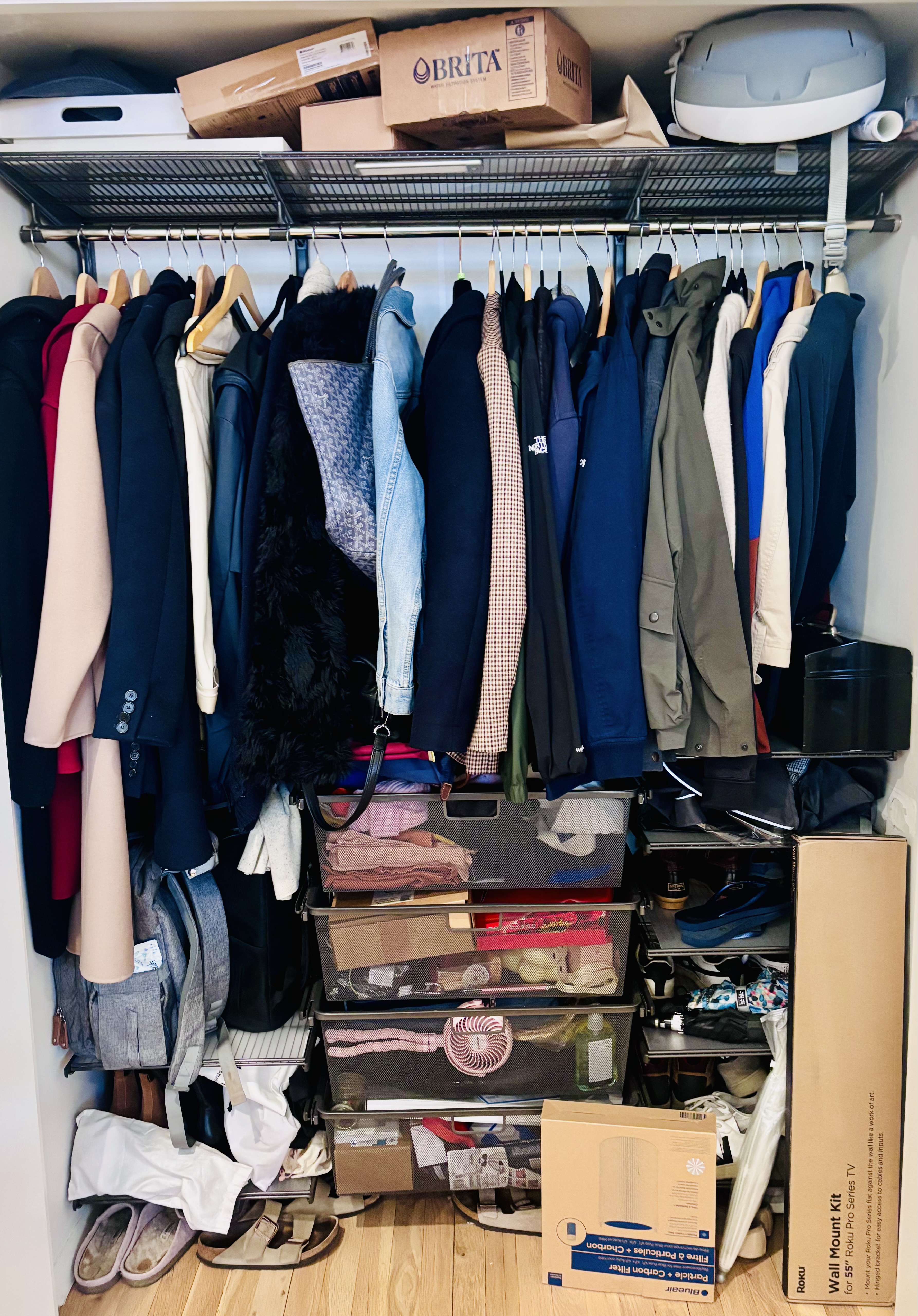 Before: cluttered coat closet