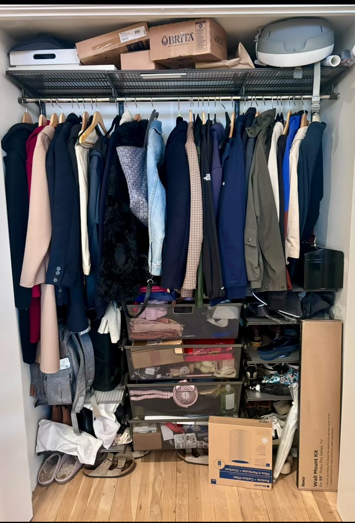 Before: cluttered coat closet